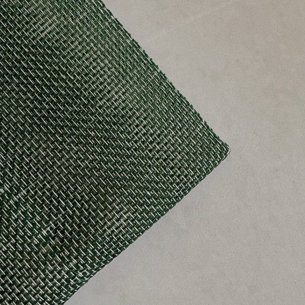 Green Japanese kitchen cloth on a grey background