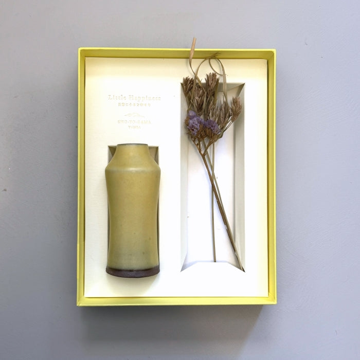 Small pottery stem vase in soft yellow glaze. Handcrafted in Japan, Tambwa Ware. Available at Toka Ceramics.